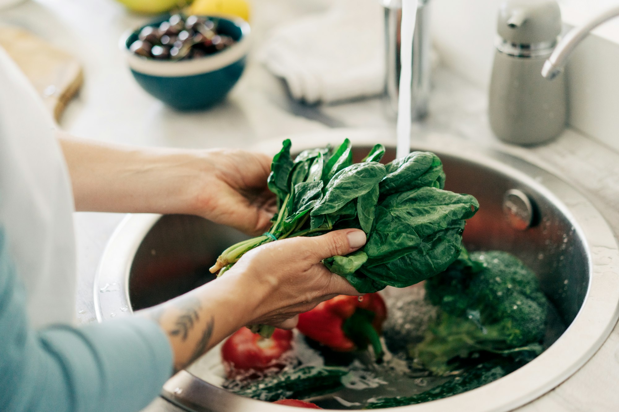 Washes greens and vegetables