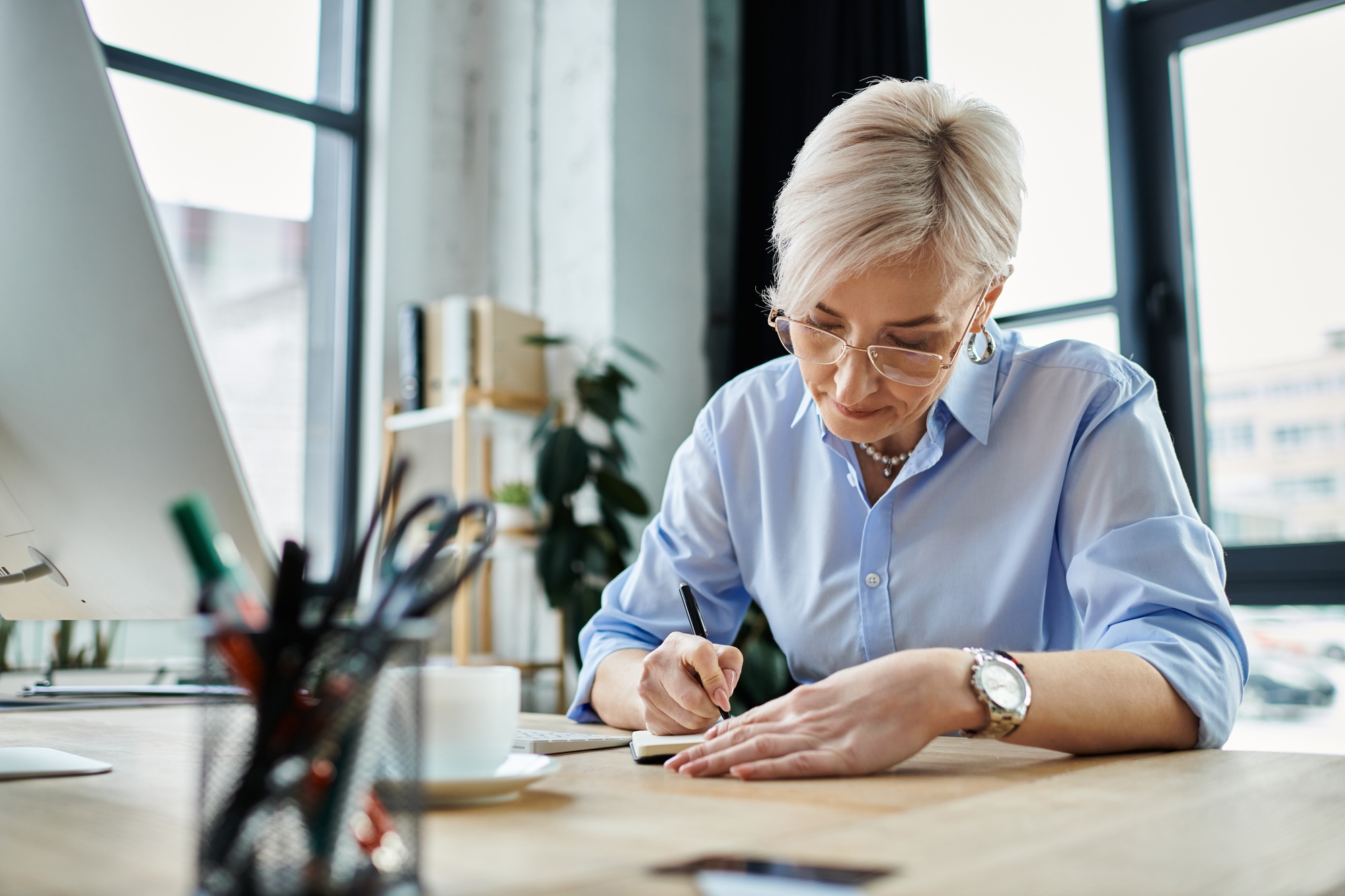 Menopausal businesswoman working