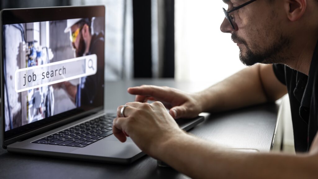 Man working on laptop and Information for the searching job, employment concept.